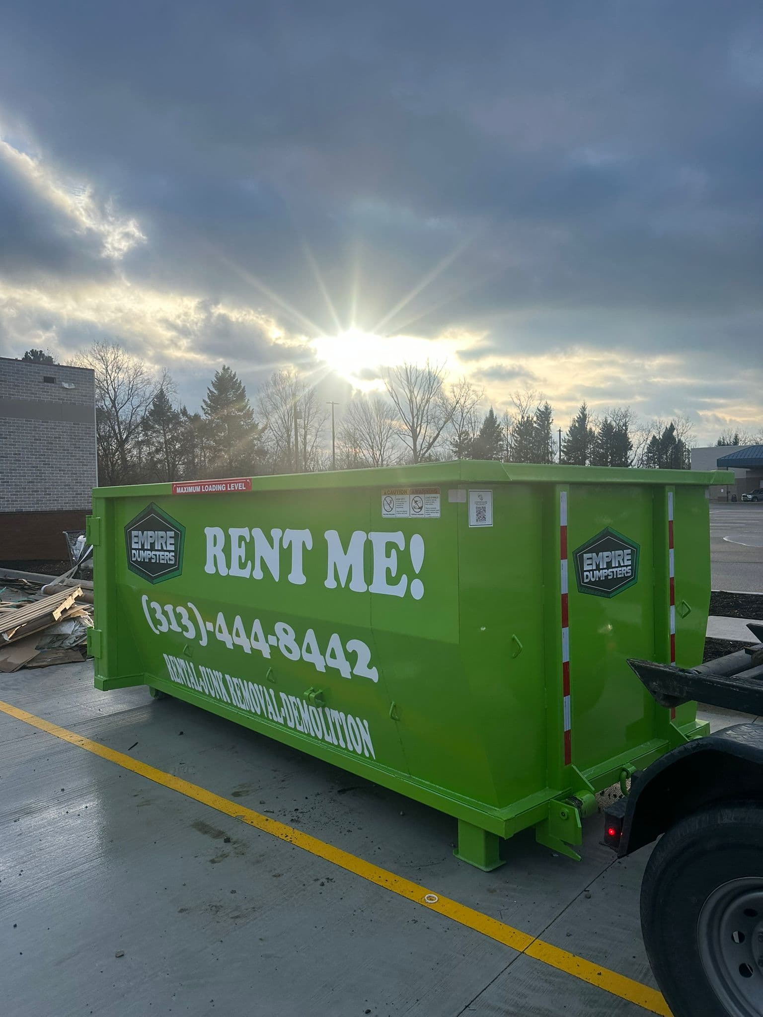 Empire Dumpsters leak-proof concrete washout container for slurry containment and heavy debris
