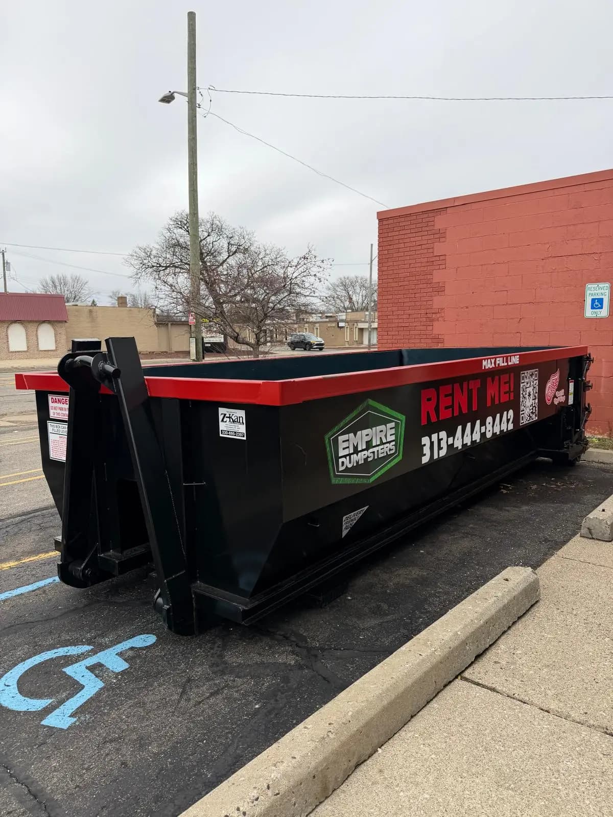 20 yard roll-off dumpster with green rails, Empire Dumpsters most-booked size